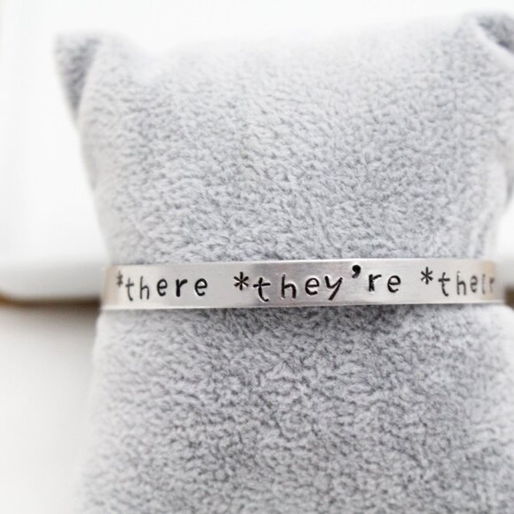 *There *They're *Their - Hand Stamped Anodized Aluminum Bangle - Adjustable - Picture 12 of 14